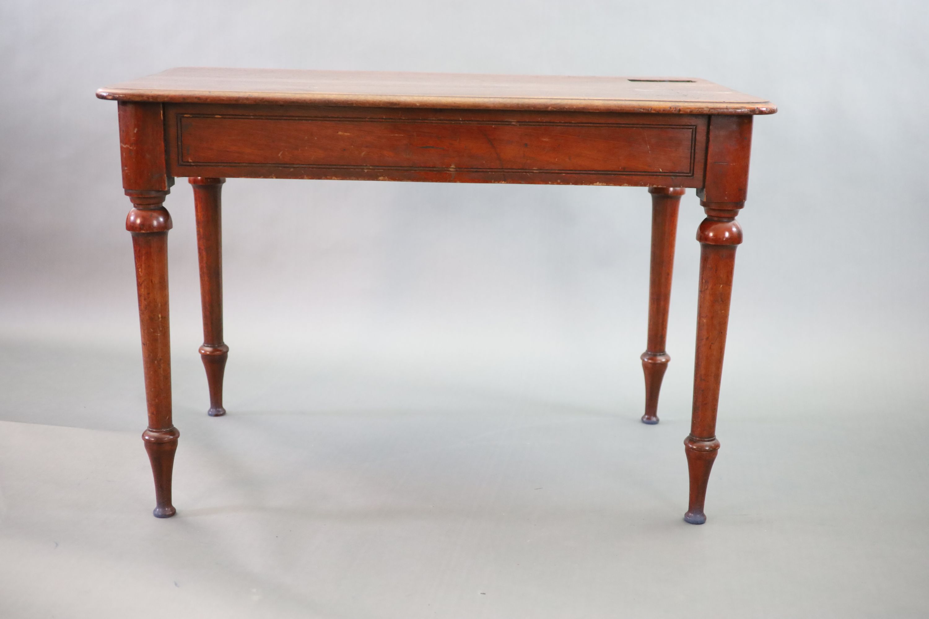 A Victorian mahogany writing table, W.114cm, D.69cm H.76cm